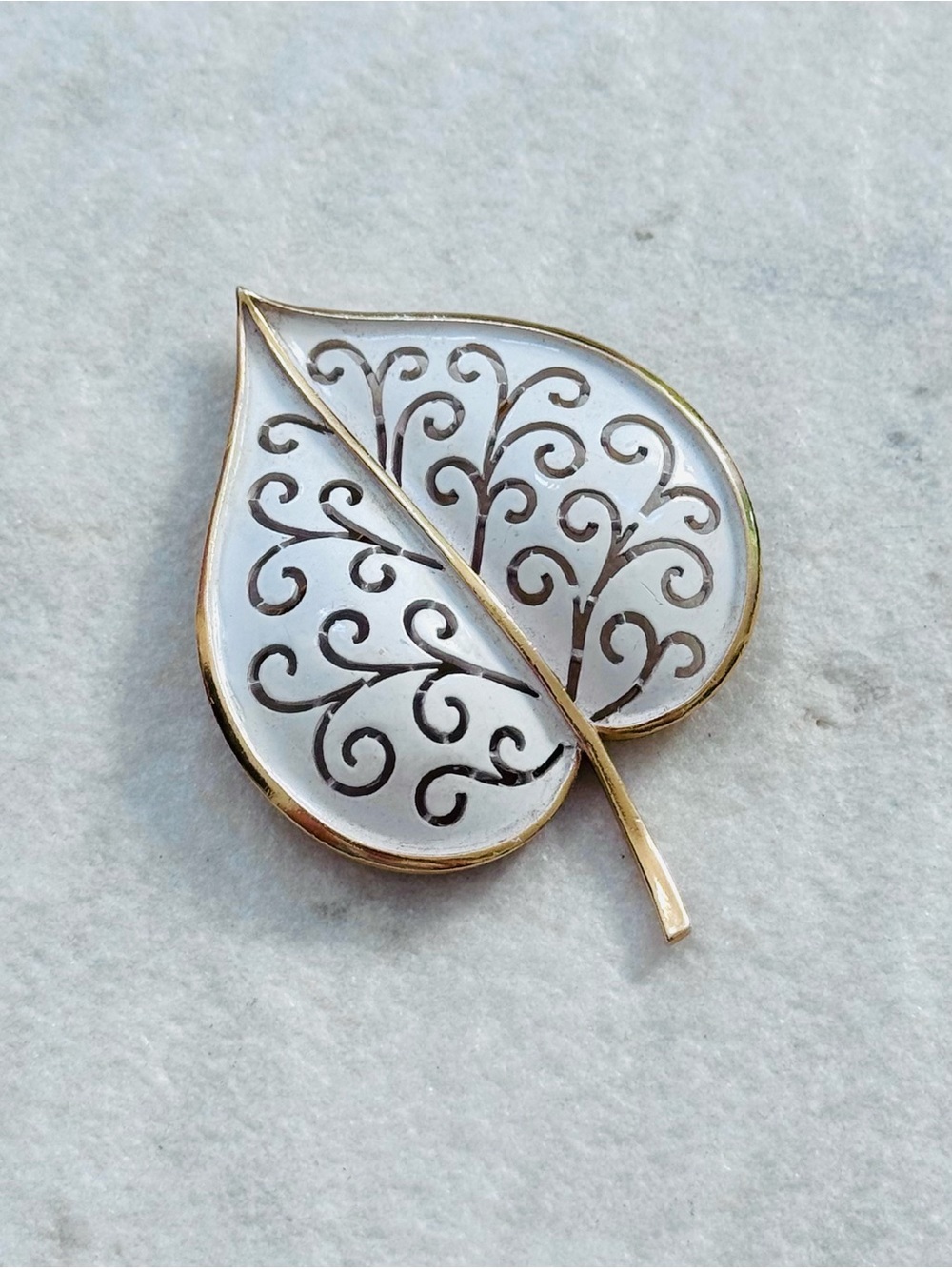 Vintage Crown Trifari White Enamel Filigree Leaf Brooch in Gold